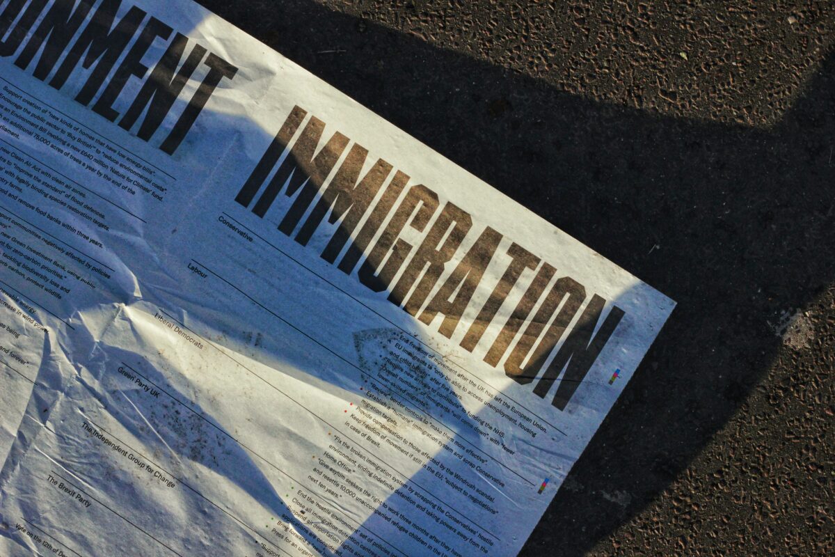 wrinkled paper titled 'immigration' Say thanks! Give a shoutout to Metin Ozer on social or copy the text below to attribute. Photo by Metin Ozer on Unsplash